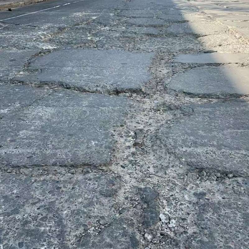 盈江路面起砂露石子修补料